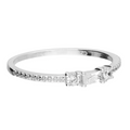 Petite baguette and round trilogy ring